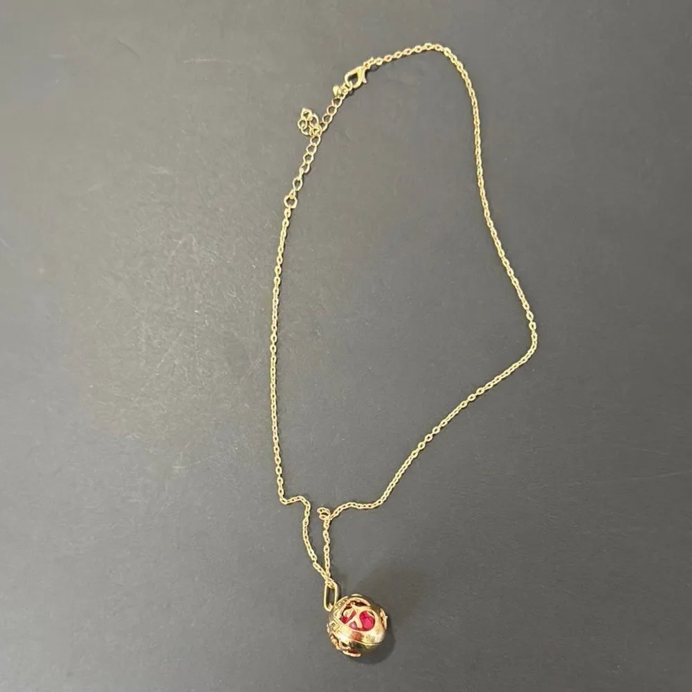 Elegant Gold and Red Pendant Necklace